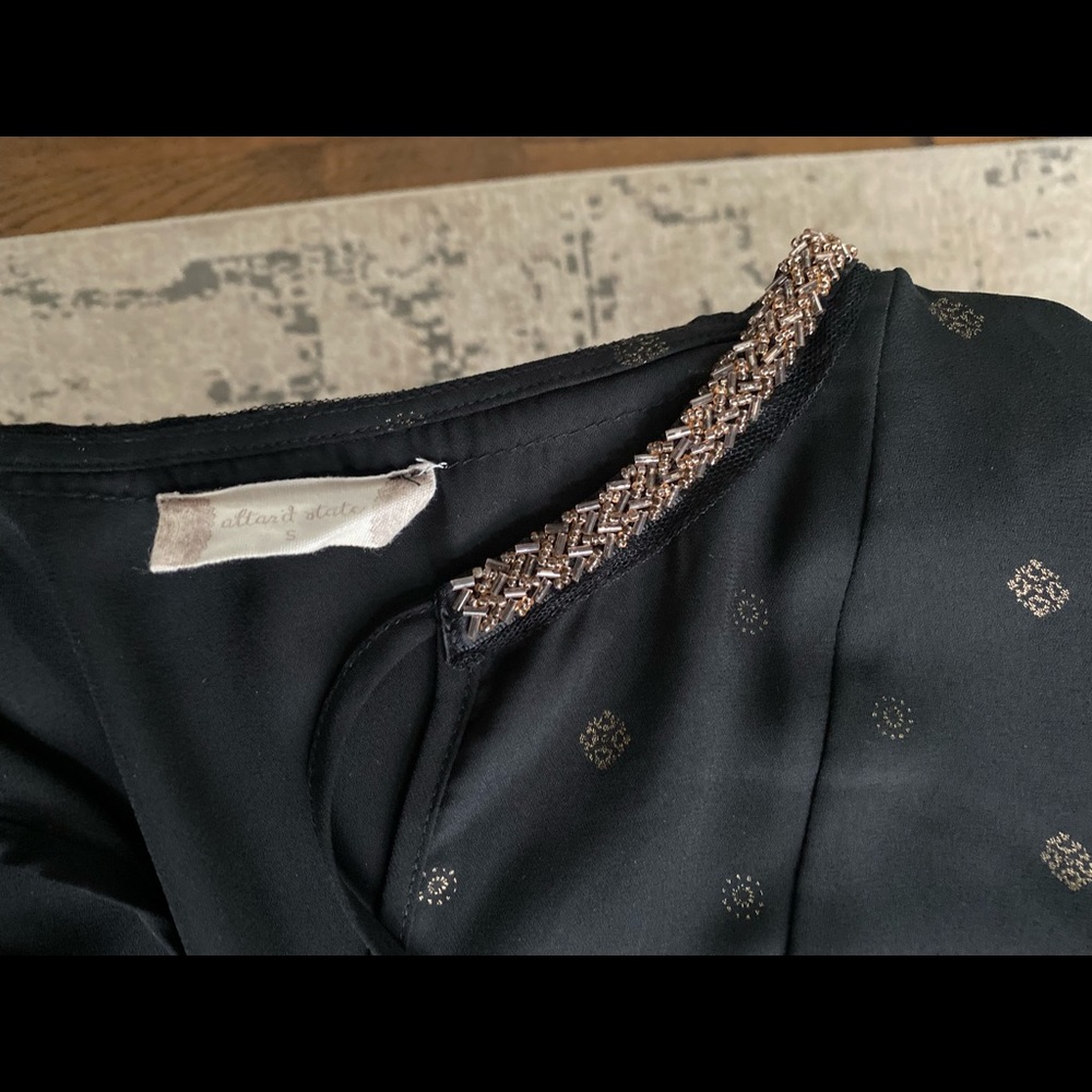 Black peplum top with gold accents - Picture 3 of 5